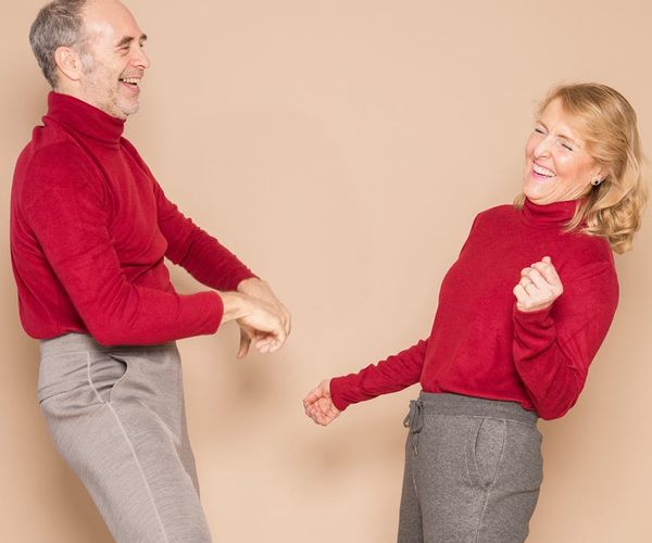Person moving freely and gracefully in a bright studio